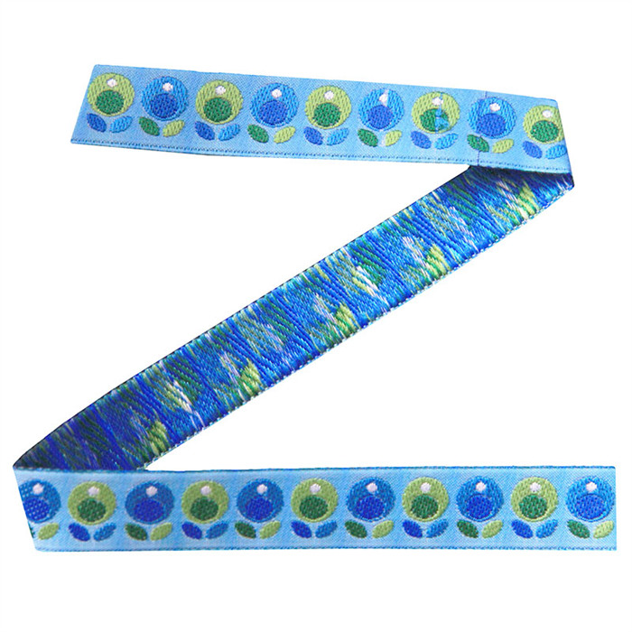 Ruban tissé fleurs vertes/bleues 16mm au mètre Ruban tissé fleurs vertes/bleues 16mm au mètre